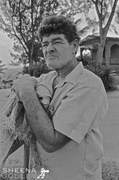 Wilson Norris with sack and hoe.jpg - 